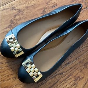 BR like new black w/gold detail closed toe flats